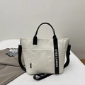 Sac cabas en nylon blanc cassé avec bandoulière noire et sangle EVES CAMIER décorée - Blanc