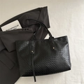 Classic black woven tote bag with a minimalist design and spacious interior for daily use - Black