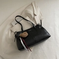 Minimalist black tote bag with Fashion tag and cute bear charm on a beige jacket - With Pendant / Brown