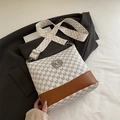 Chic monogram canvas crossbody bag with brown leather trim and geometric wide strap - White