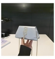 Detail of silver small square bag featuring metallic texture, S-letter logo and tassel - Silver