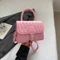 Pink quilted leather crossbody handbag with gold hardware and fashion lettering - Pink
