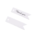 Close-up of white fishtail paper gift tags with Thank You print and hanging holes - Thank You / White