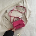 Mini rose pink crossbody bag in glossy leather finish with top handle and silver hardware - Rose Pink