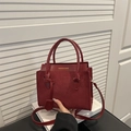 Elegant burgundy large capacity shoulder bag with matte texture and gold accents - Red