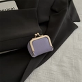 Mini lavender kiss-lock coin purse featuring premium lychee grain faux leather - Purple