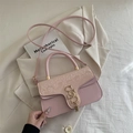 Light pink PU leather crossbody bag with snake skin pattern flap and golden logo - Pink