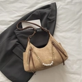 Brown suede hobo bag with pearl metal chain and long tassel detail on black blazer - Khaki