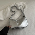 Silver metallic dumpling shoulder bag with pleated strap and shiny synthetic leather finish - Silver
