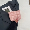 Pink quilted cosmetic bag with soft puffy texture and gold zipper in stylish hand-held style - Pink