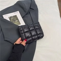 Quilted puff handbag in black with square stitching pattern for a minimalist style - Black