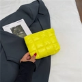 Quilted puffer makeup bag in bright yellow finish with lightweight padded texture - Yellow