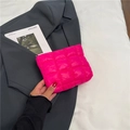 Quilted rose red puffer cosmetic bag with checkered pattern held in hand - Rose Red