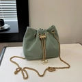 Sage green corduroy bucket bag with pearl drawstring and golden chain strap detail - Green