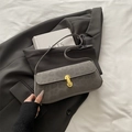 Grey leopard print baguette bag with golden metal clasp and suede texture finish - Gray