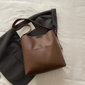 Dark brown high-capacity leather bucket bag with elegant stitching and matte finish - Dark Brown
