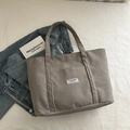 Grand sac fourre-tout en velours côtelé gris avec étiquette Fashion Instinct à l'avant - Gris