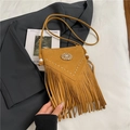 Bohemian mustard yellow suede crossbody bag with vintage rivets and long fringe - Brown