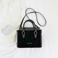Minimalist black faux suede and leather handbag with gold fashion lettering - Black