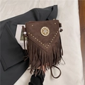 Brown vintage suede crossbody bag featuring golden rivets, floral medallion and fringe - Coffee