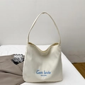 Grand sac cabas blanc cassé avec broderie bleue C'est la vie et inscription HYLLZZA - Blanc