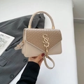 Beige patchwork crossbody bag featuring woven texture leather and gold S buckle decoration - Khaki
