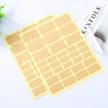 Self-adhesive kraft paper labels with decorative scalloped edges on white background - Kraft Color