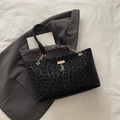 Large black leopard print tote bag with gold deer charm and chain shoulder strap - Black