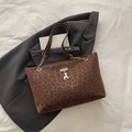 Chic leopard print tote bag with brown velvet texture and golden deer pendant detail - Brown