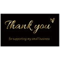 Detail of gold foil Thank You card with heart icon on elegant black background - Card 3 / Instruction Card
