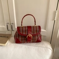 Detail of red and blue tartan handbag with premium leather trim and golden horseshoe buckle - Red