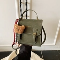 Vintage dark green faux leather backpack with plush bear pendant and top handle - With Pendant / Green