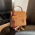 Brown PU leather mini backpack with bear charm and adjustable straps for women - With Pendant / Brown