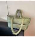 Detailed view of olive green quilted puffer tote bag with handles and round shoulder strap - Green