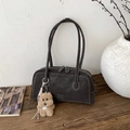 Brown vintage bowling bag in matte finish with contrast stitching and teddy charm - Brown