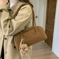 Retro dark brown suede bowling bag with shoulder strap and plush dog accessory - Brown