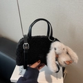Chic black plush faux fur shoulder bag with leather handles and a cute rabbit charm - Black with Pendant
