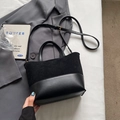Black bucket bag with suede and leather patchwork, featuring top handle and adjustable strap - Black without Pendant
