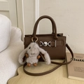 Dark brown pebble leather crossbody bag with silver heart clasp and rabbit charm - Coffee with Pendant
