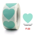 Détail d'autocollants coeur vert menthe en rouleau montrant la taille de 2,5cm 1 pouce - Cœur Vert Menthe (F-23)