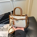 Mini cream checkered crossbody bag with brown leather accents and wooden bead charm - White