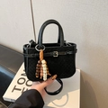 Black woven textured mini handbag with beaded charm and adjustable shoulder strap - Black
