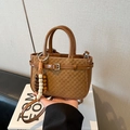 Brown minimalist crossbody bag with woven texture, beaded tassel and round handle - Brown