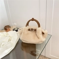 Elegant beige faux fur crossbody bag with brown leather handles and gold buckle detail - Apricot