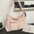 Pink oversized canvas hobo bag with multiple large pockets and adjustable shoulder strap - Pink