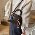 Dark brown leather Boston pillow bag with wood bead charm and adjustable strap - Brown