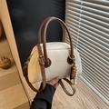 Chic cream leather bowling bag with brown handles and beaded charm detail - Off White