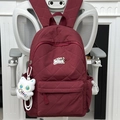 Stilvoller weinroter gesteppter Rucksack mit Rautenmuster und weißem Katzenanhänger - Mit Katzenanhänger / Rot