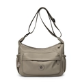 Dettaglio della borsa a tracolla in nylon kaki impermeabile con tasche multiple e cinturino - Cachi