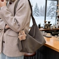 Dark brown hobo shoulder bag with matte leather and cute puppy charm accessory - With Charm / Green